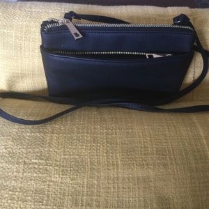 Small black purse with shoulder strap